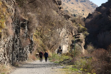 mountain landscape with people walking