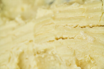 A portion of mashed potatoes with cream, close-up. It highlights its delicate texture and mouth-watering appearance. With space to copy. High quality photo