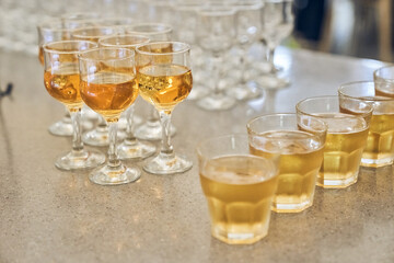 Wine glasses filled with white wine, showcasing the elegant serving. With space to copy. High quality photo