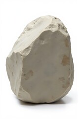 Obraz premium A light beige, irregularly shaped rock with some darker spots