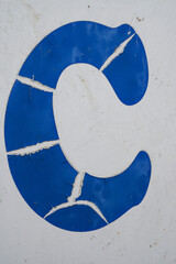 ruined blue letter C 