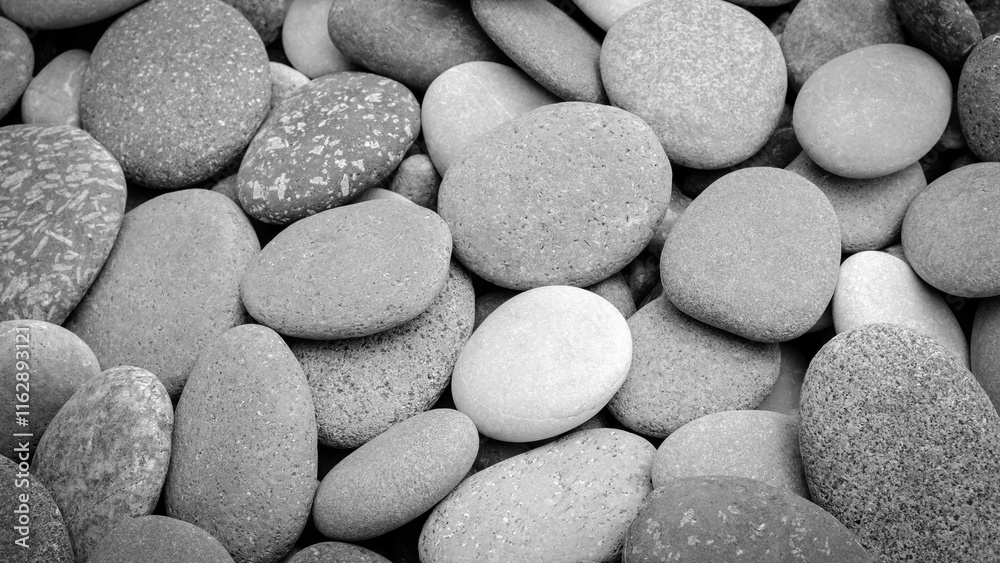 Poster abstract black and white background with round pebble stones