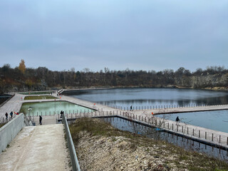 Zakrzowek Reservoir, swimming pool - artificial water reservoir in Krakow in Zakrzowek in autumn in cloudy weather. It was created in 1992 after flooding an old limestone quarry