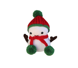 Adorable crochet snowman wearing red and green winter clothes on transparent background
