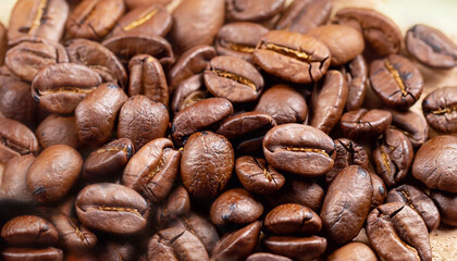 Fototapeta premium This image shows a detailed closeup of a pile of coffee beans