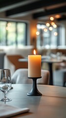 Elegant candlelight setting at a modern restaurant during evening dining