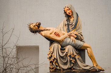 Pieta, Saint Mary supporting the body of crucified Christ. Beautiful Piet type, medieval sculpture, 1400 year © Maryna Konoplytska