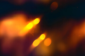 Blur colorful warm rainbow light leaks on black background with dust texture. Defocused abstract damaged scratched retro film analog effect for using over photos as overlay or screen filter