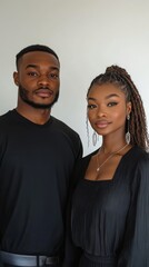 Young couple standing casually in stylish outfits during a cool day in autumn season