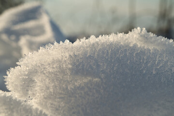 A picturesque winter scene of snow in a rural area, featuring both modern and retro elements in a serene natural setting.Christmas, Holidays, Childhood, Crystals, Ice