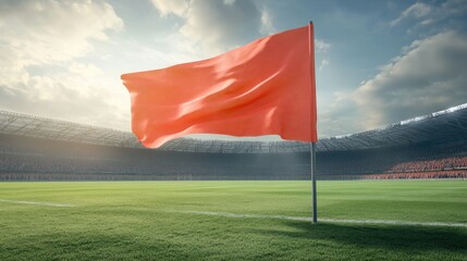 Corner flag at a stadium with a vibrant green pitch and an enthusiastic crowd in the background under a dramatic sky