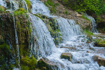 Slovenian keys or streams of the Twelve Apostles, natural and tourist object, Orthodox shrine. Russia, Pskov Region. Izborsk fortress. High quality photo