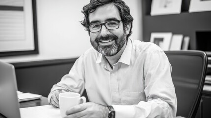 Fototapeta premium Portrait of a Smiling Man in His Office