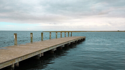 Obraz premium wooden pier in the sea