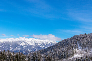 Landscape photo of mountain peaks of Julian Alps, winter time in Slovenia