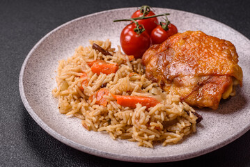 Delicious fresh pilaf with rice, carrots, meat, onions, spices and berries