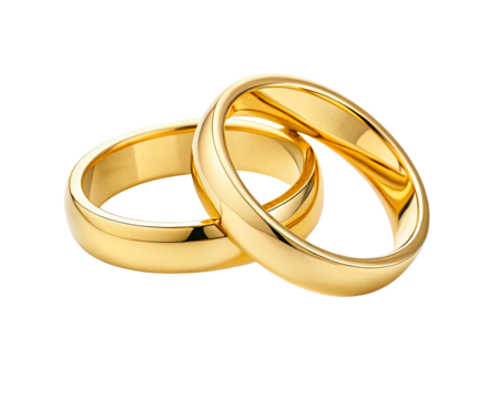 Elegant wedding rings displayed together in warm lighting isolated on transparent background