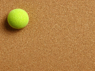 Green Ball on Corkboard Illustration
