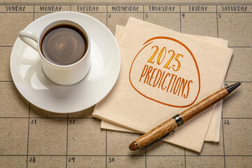 2025 predictions - handwriting on a napkin with a cup of coffee, business and financial trends and...