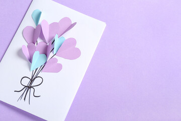 Beautiful greeting card for Valentine's Day celebration on lilac background