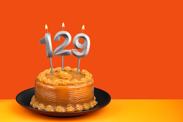 Birthday cake with dulce de leche frosting - Candle number 129