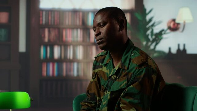 African american soldier remembering war flashbacks and dealing with a serious case of shell shock syndrome, traumatic memories. Armed forces veteran feels guilty with PTSD. Camera B.