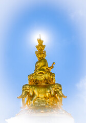 Silhouette of the golden  Buddha at the Golden summit of Mount Emei,  Sichuan, China. 