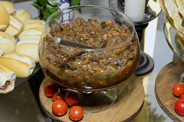In a glass jar, a delicious eggplant appetizer for the meeting