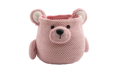 Pink teddy bear-themed textured storage basket with a cute face design, rounded ears, and a friendly expression, perfect for adding charm to nursery decor. Isolated on white background. 