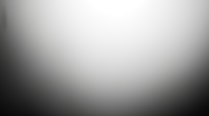 A gradient of light transitioning from white to black, creating a smooth, abstract background.