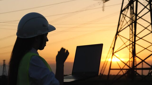 silhouette electrical engineer, work computer tablet sunset, electric tower, digital hand, uses tablet, American worker, solar panels replacement, tablet work near electricity tower, electrical