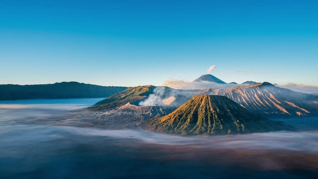 Zoom in Time Lapse, Mount Bromo volcano (Gunung Bromo) during sunrise in Bromo Tengger Semeru National Park, East Java, Indonesia.