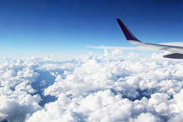 Obraz premium Beautiful Cloudy Sky with Clouds from Airplane Window and Plane Wing