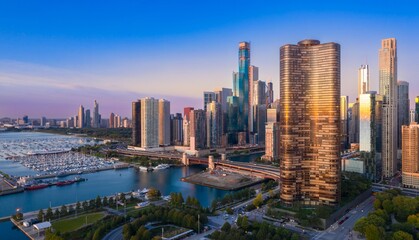 Chicago skyline at sunrise, showcasing iconic architecture, a marina, and city life. Urban...