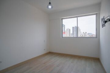 habitacion moderna de departamento, iluminado con ventana a la calle 