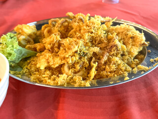 Crispy, deep-fried seafood coated in flour batter