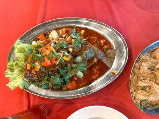 Deep fried seabass with three type of sauce, sweet, spicy and sour, famously known as Ikan Siakap 3...
