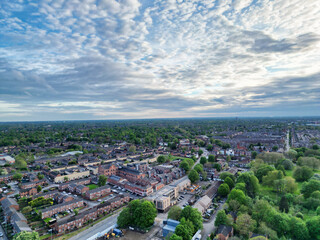 Obraz premium Aerial View of Buildings at Greater Manchester Central City, Northwest of England, United Kingdom. Aerial View Footage Was Captured with Drone's Camera on May 4th, 2024 During Sunset Time.
