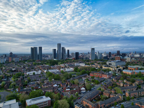 Aerial View of Buildings at Greater Manchester Central City, Northwest of England, United Kingdom. Aerial View Footage Was Captured with Drone's Camera on May 4th, 2024 During Sunset Time.