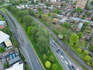 Aerial View of Buildings at Greater Manchester Central City, Northwest of England, United Kingdom. Aerial View Footage Was Captured with Drone's Camera on May 4th, 2024 During Sunset Time.