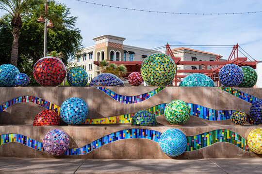 Scottsdale, AZ - Nov. 26, 2024: Pinball Wizard by Annette Coleman is in Old Town Scottsdale at Stetson Plaza. The sculpture features one inch hand cut stained glass tiles on twenty-eight spheres.