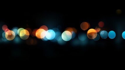 Abstract blur bokeh of soft glowing lights on dark background