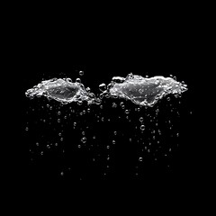 Water Splash with Bubbles on Black Background