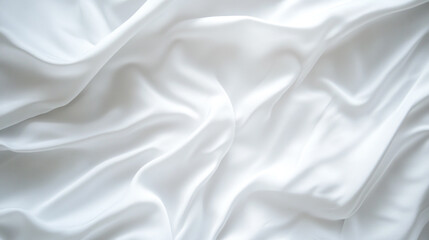 Naklejka premium Soft white fabric draped elegantly on a smooth surface creating a serene atmosphere