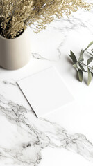 A customizable business card mockup placed on a marble desk, ideal for showcasing your branding.
