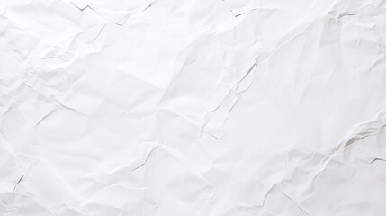 Fototapeta premium Crumpled white paper texture with detailed folds and shadows on a flat surface