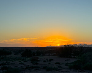 Obraz premium Sunset in the Wadi Draa valley near Zagora in Morocco