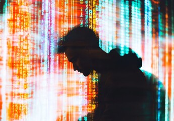 An anonymous hacker seating in front of a commanding monitor, engrossed in the process of deciphering intricate lines of code, highlighting network system vulnerability.	