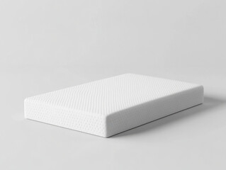 minimalist white mattress on light background, showcasing its sleek design and texture. Ideal for modern bedroom aesthetics and comfort