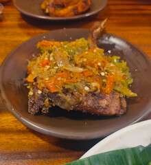 Fried duck with typical Indonesian chili sauce